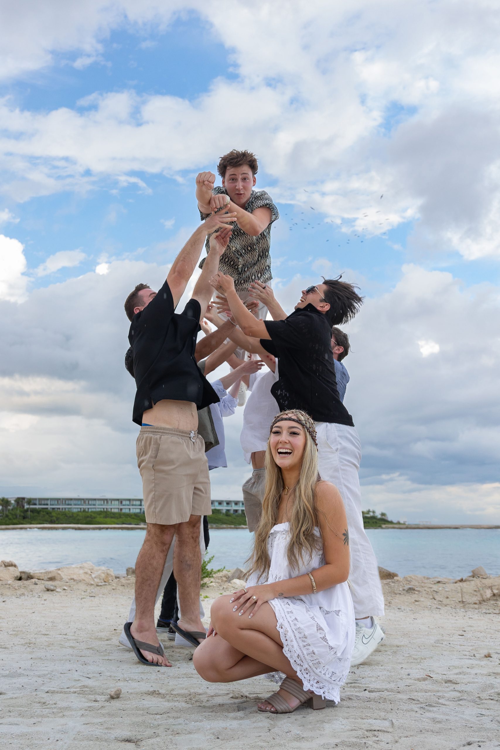 Newly engaged couple celebrating on the beach at Hilton Tulum
