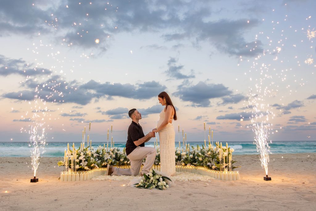 Beach proposal with sparklers